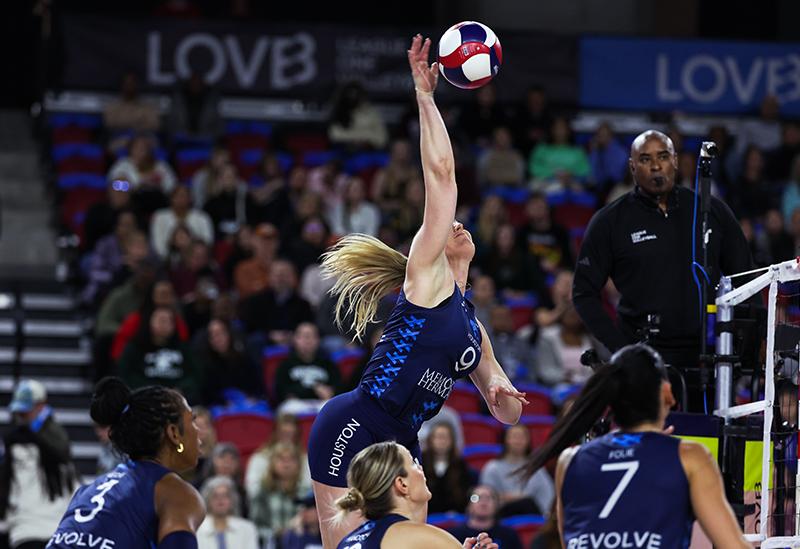 volley ball player spiking the ball